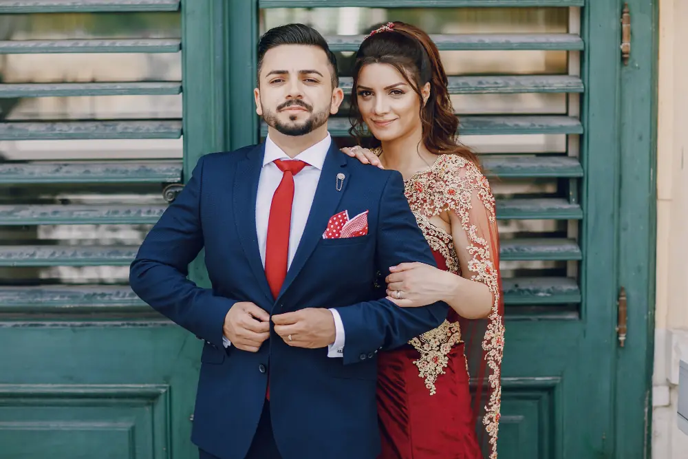 A well-dressed couple together in India